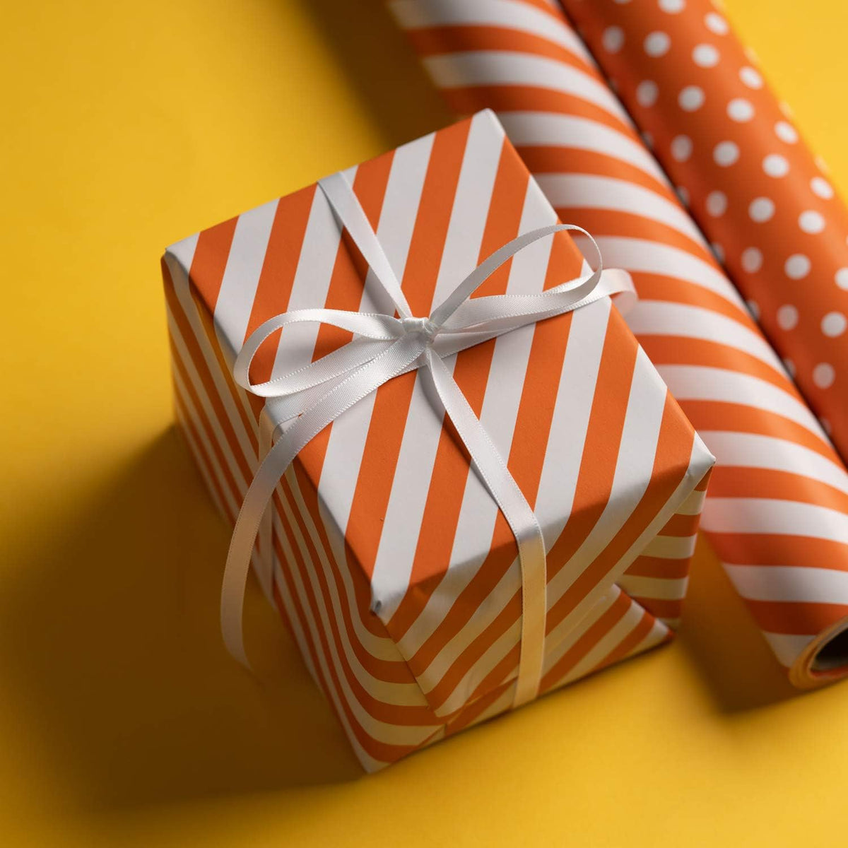 WRAPAHOLIC Reversible Wrapping Paper - Mini Roll - 17 Inch x 33 Feet - Orange and Stripes Design