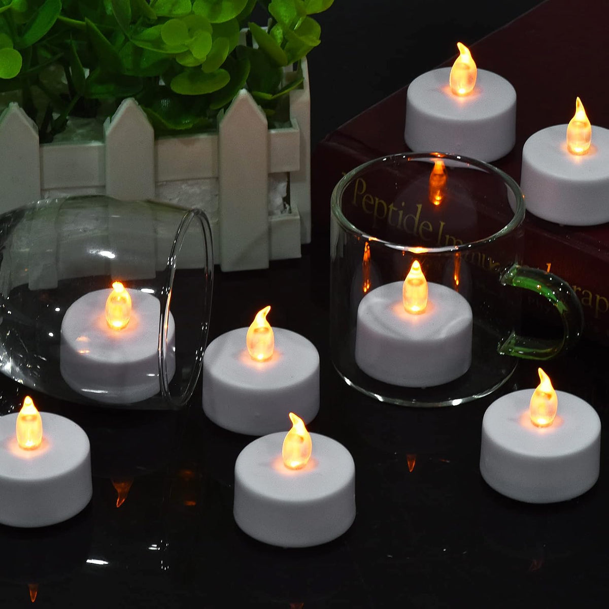 LED Tea Lights Candles- 12PACK Warm Yellow Flameless Candles Realistic and Bright Flickering Long