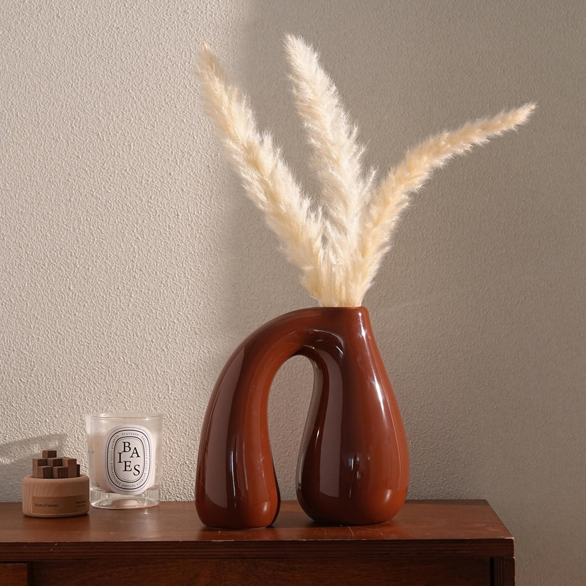 Brown Ceramic Vase – Glossy Modern Sculptural Décor, Arch Handle Artistic Design, Warm Earth-Tone